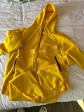 Rudolph Sportswear Yellow and a Red Hooded Zip-Up Sweatshirt